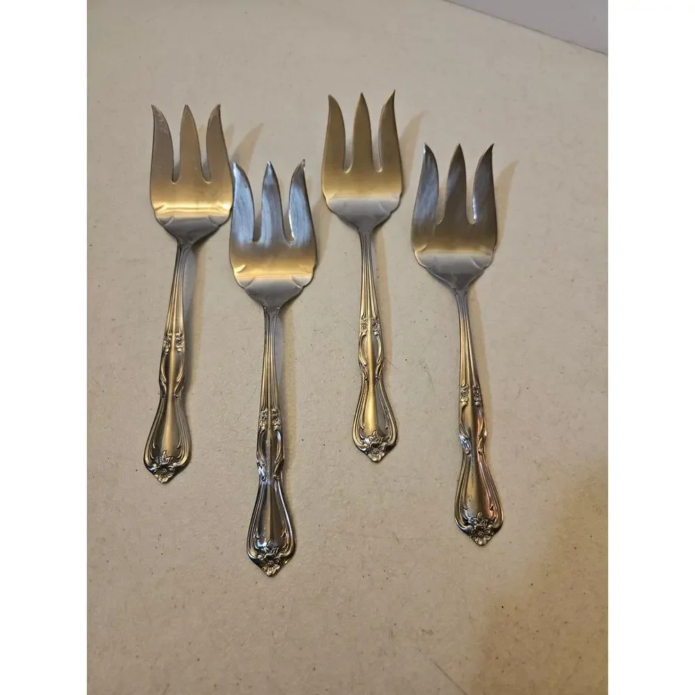 Lot of 4 stainless serving forks by International Silver Co floral flower design